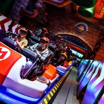 Professional travel advisor Katy Thompson scouting the Super Nintendo World queue at Epic Universe to provide clients with inclusive seating and fit tips for Mario Kart.