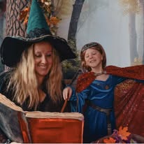 Travel agent Katy Thompson of GallivantersVacations in Salem dressed as a witch with her daughter