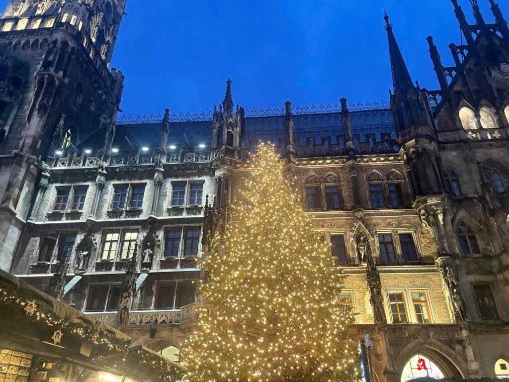 Beautiful lit Christmas tree at Christmas Markets of Munich Germany during Christmas