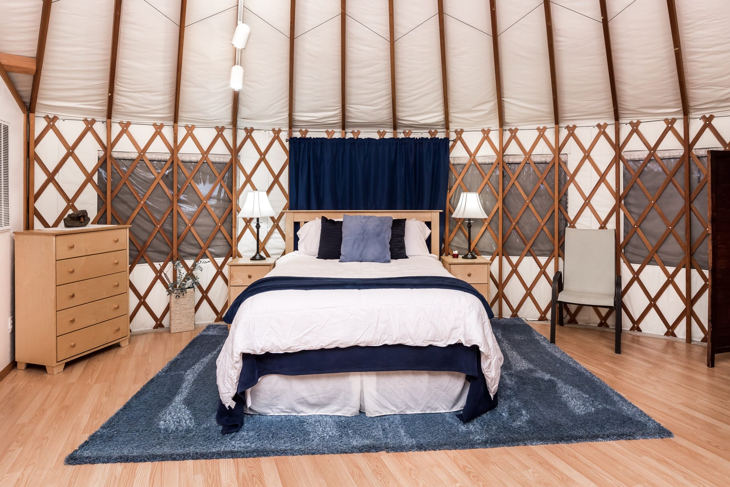 King size bed in a Yurt at Stonewind Retreat in Northwest Arkansas