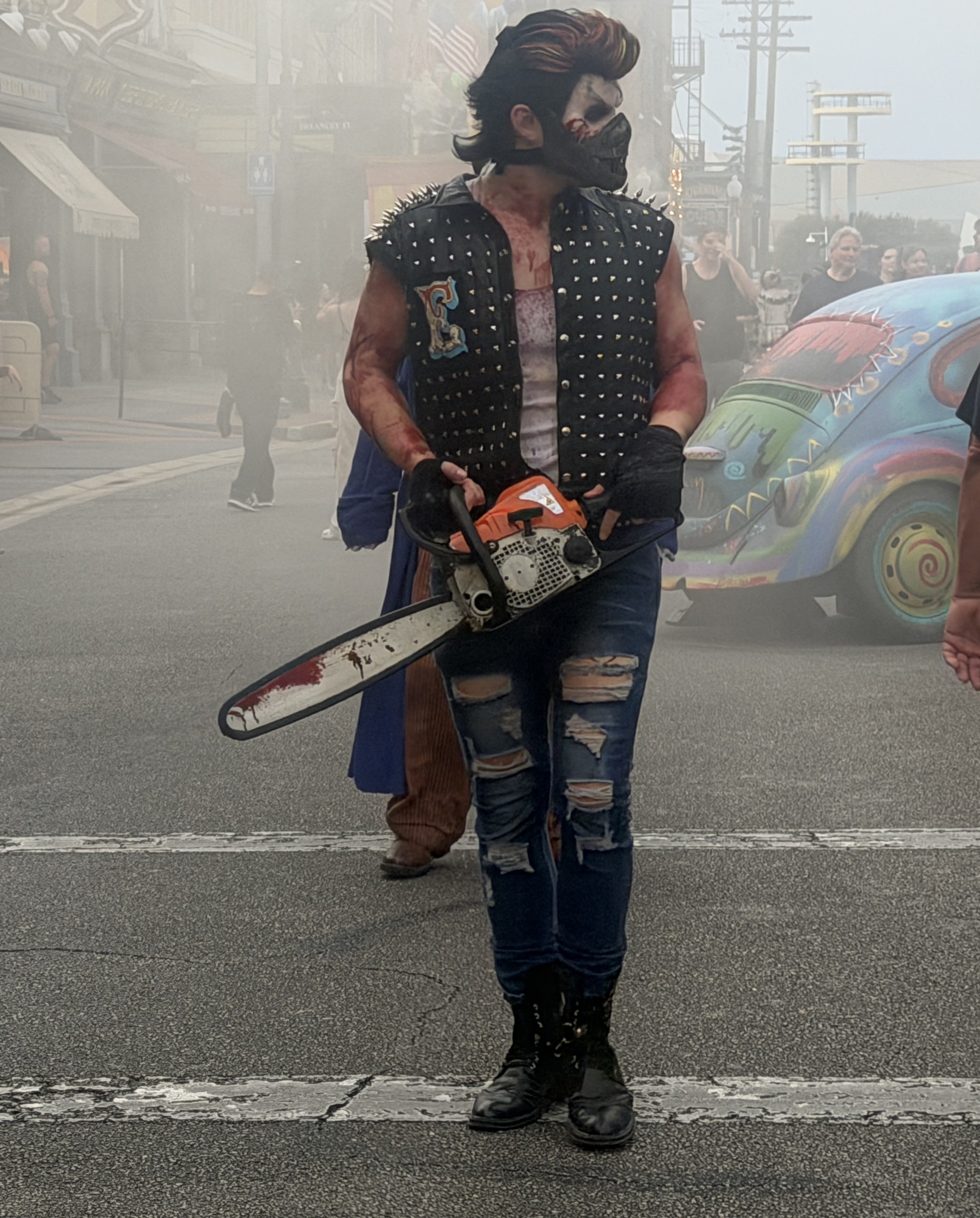 A character actor in a scare zone at Halloween Horror Nights at Universal Studios in Orlando, Florida.